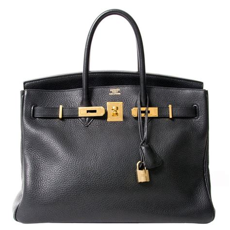 hermes black barrel handbag|hermes black bag price.